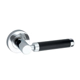 Zest Lever Door Handle in dual tone black and chrome, 134 mm, showcasing a modern design by Spira Brass for stylish interior spaces.