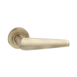 Aero Lever on Rose Door Handle in Matt Antique finish, featuring a 143mm lever length, designed for modern homes and professionals by Spira Brass.