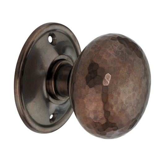 Hammered Cottage Large Mortice/Rim Door Knob with unique hammered texture in antique finish, 55 mm diameter, part of the Spira Brass range.