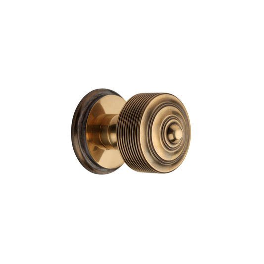 Mortice/Rim Door Knob with intricate ribbed texture in aged brass finish, 60mm size from the Carter range.