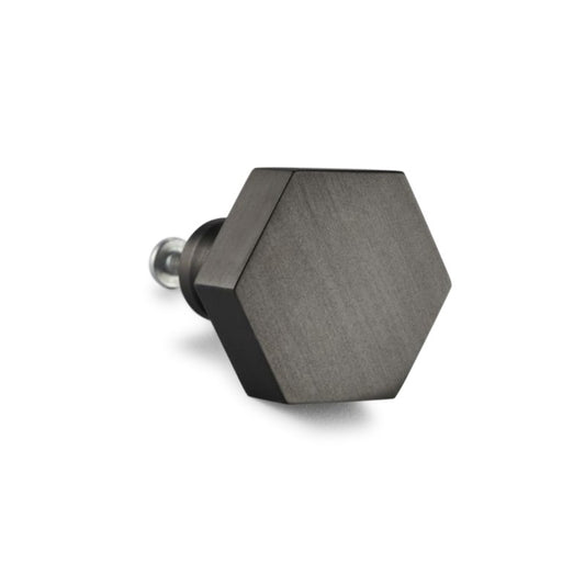 Hexagonal cupboard knob in gunmetal grey, 38mm size, featuring an ergonomic design and luxurious Spira Brass material, perfect for modern cabinetry.