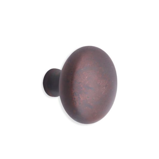 Mushroom 38mm cupboard knob in aged bronze with ergonomic design, perfect for cabinetry enhancement by Spira Brass.