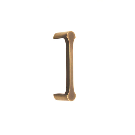 Antique Brass Tulip Pull Handle 115mm by Spira Brass, showcasing a stylish design with rounded edges, perfect for enhancing cabinetry elegance.