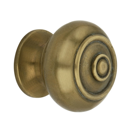 Small Bloxwich cupboard knob in aged brass with reeded texture, 30mm, perfect for enhancing cabinetry.