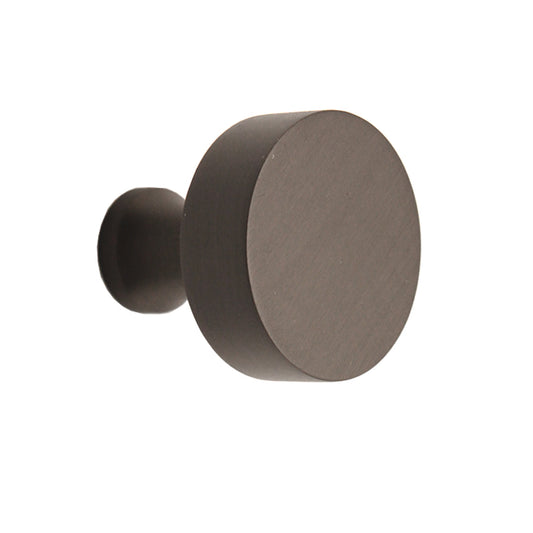 Round Cupboard Knob in Gunmetal Grey, 38mm size, featuring an ergonomic design for stylish and functional cabinetry enhancement.