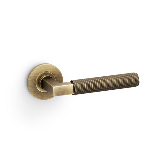 Hurricane Knurled Lever Door Handle - Antique Brass