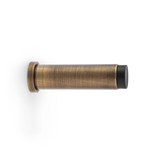 Projection Cylinder Door Stop - Antique Brass | Alexander & Wilks Plain