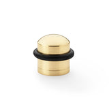 "Polished brass dome top floor mounted door stop by Alexander & Wilks, showing solid brass construction and easy installation design"