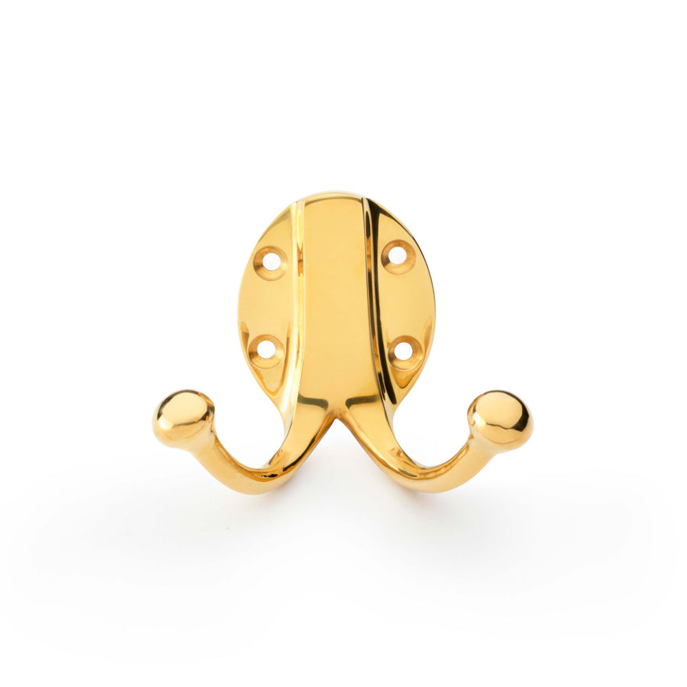 Traditional Double Robe Hook in Unlacquered Brass by Alexander & Wilks, showing dual hooks on a classic oval backplate, ideal for enhancing home decor.