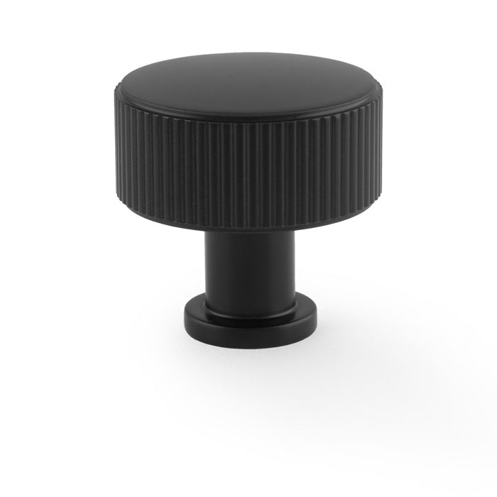 "Alexander & Wilks Lucia Reeded Cupboard Knob in Black Finish, 35mm, showing elegant design and secure grip texture"