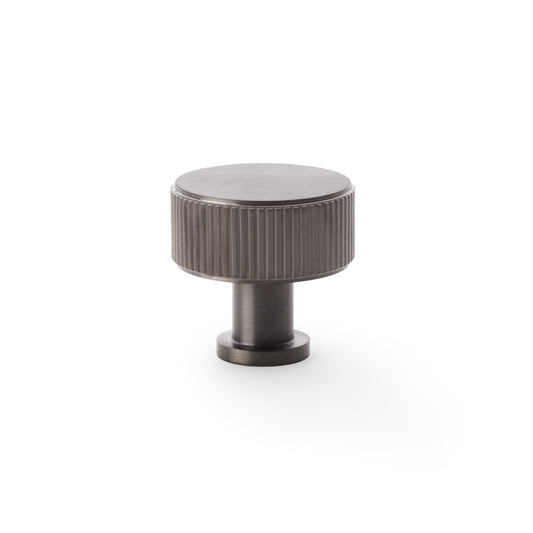 Alexander & Wilks Lucia 35mm Reeded Cupboard Knob in Dark Bronze, ideal for enhancing home or professional interiors, featuring durable solid brass construction and a textured grip.