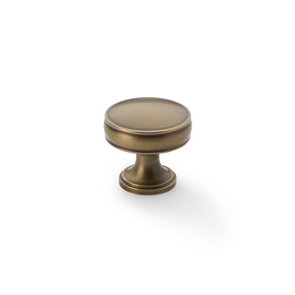 Antique Brass Alexander and Wilks Lynd Cupboard Knob, 32mm diameter with fluted stem and decorative rings, ideal for traditional and modern decors