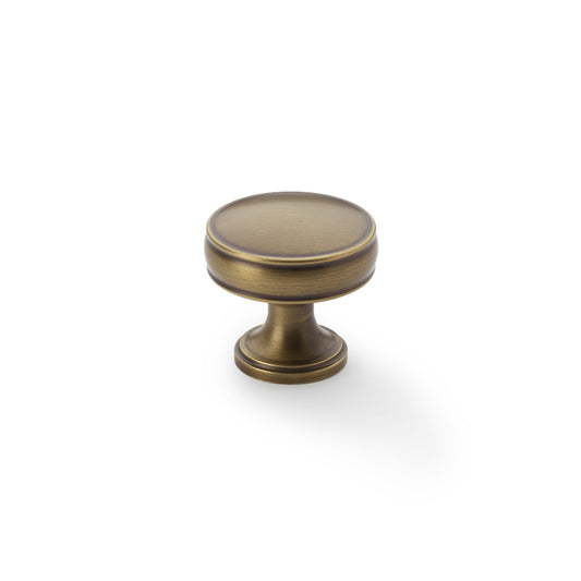 Antique Brass Alexander and Wilks Lynd Cupboard Knob, 32mm diameter with fluted stem and decorative rings, ideal for traditional and modern decors