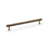 Antique brass reeded T-bar cupboard pull handle by Alexander & Wilks Crispin, 224mm center-to-center, solid brass with textured grip