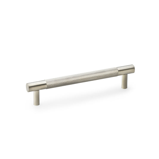 "Satin nickel knurled T-bar cupboard handle from Alexander & Wilks, designed with a unique texture for a secure grip and an industrial aesthetic"