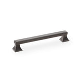 "Solid brass Alexander & Wilks Jesper cabinet pull handle in dark bronze PVD, 160mm centres, on a pyramid-shaped pedestal"