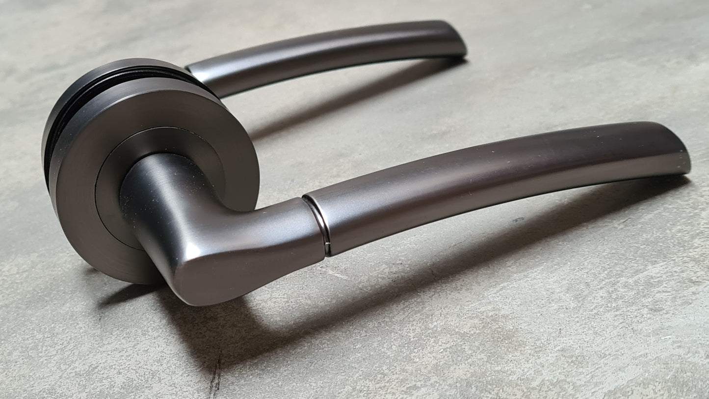 Gun Metal Grey Falcon Design Door Handles on Round Rose