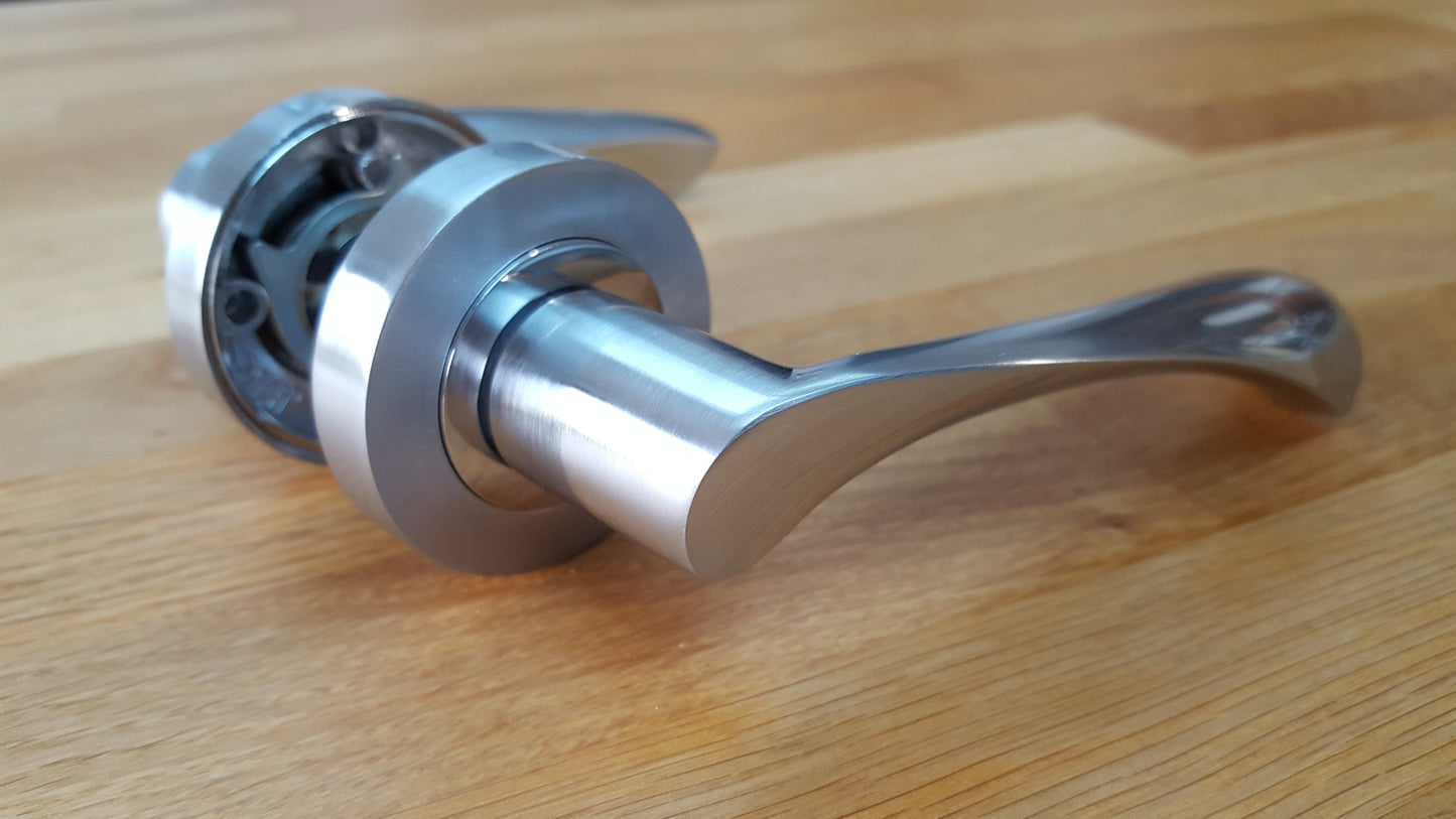 Twirl Dual Finish Door Handles On Round Rose