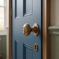 Aged Brass Bloxwich Mortice/Rim Door Knobs (Solid Brass) 63mm - SB2104AB - fitted on a door