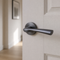 Gun Metal Grey Twist Design Door Handles on Round Rose - IH-ZET.09.MSB - fitted on a door