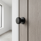 Spira Brass 'Connaught' Matt Black Knurled Mortice/Rim Door Knobs - SB2123BLK - fitted on a door