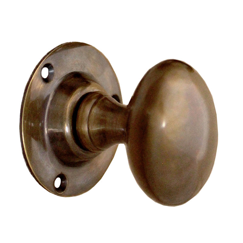 Antique Oval Mortice Door Knob in solid brass, unsprung design, 60mm x 38mm, perfect for traditional and modern interiors.