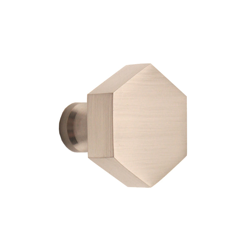 Hexagonal Cupboard Knob in Satin Silver, 38mm ergonomic design by Spira Brass, enhancing cabinetry with modern style and comfortable grip.