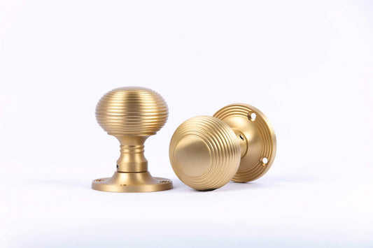 Beehive Reeded Mortice Door Knobs In Satin Brass