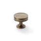 Antique brass 38mm Alexander & Wilks Lynd cupboard knob featuring dual ring detailing and fluted stem.