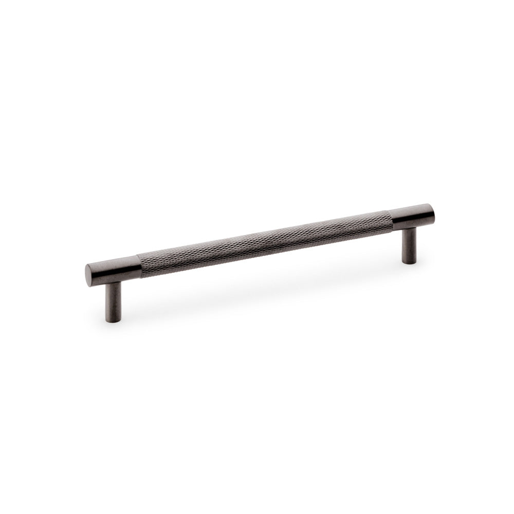 "Knurled T-Bar Cupboard Handle by Alexander & Wilks in Dark Bronze PVD, showcasing diamond knurling and industrial design, 160mm centres"