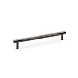 "Knurled T-Bar Cupboard Handle by Alexander & Wilks in Dark Bronze PVD, showcasing diamond knurling and industrial design, 160mm centres"