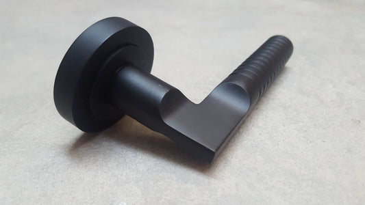 Matt Black Engineered Lever Door Handles On Round Rose