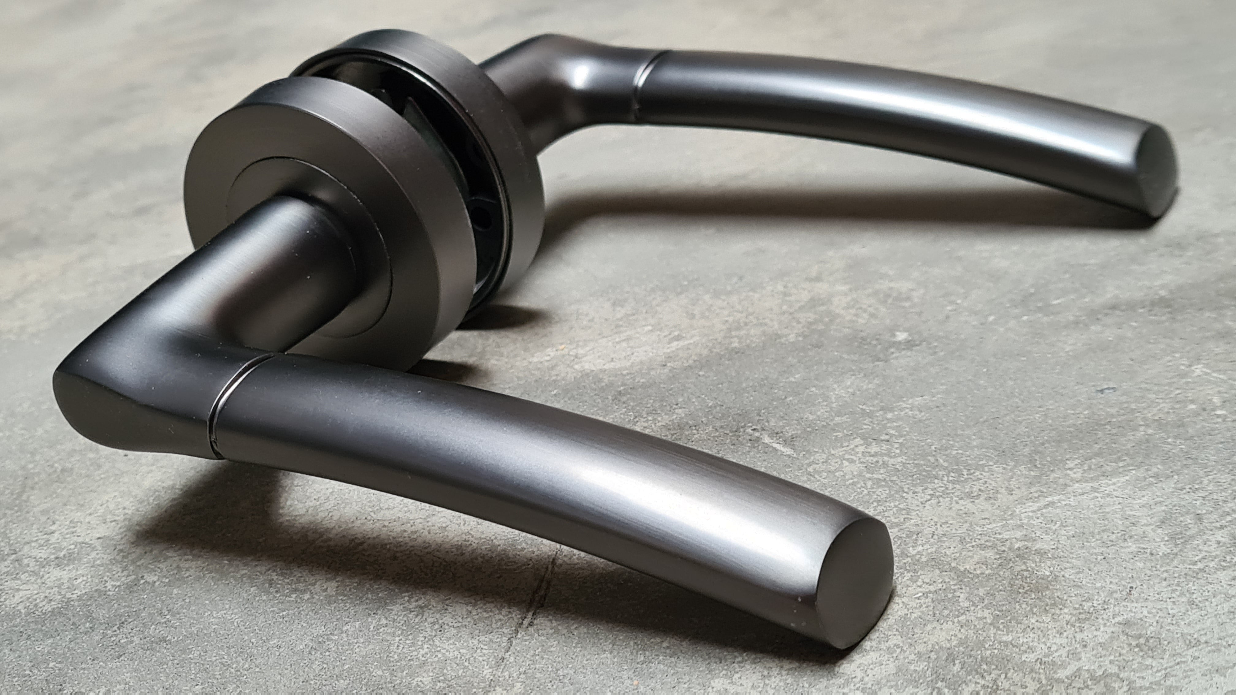 Gun Metal Grey Falcon Design Door Handles On Round Rose More 4 Doors gun-metal-grey-falcon-design-door-handles-on-round-rose-more-4-doors