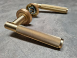 Frelan Hardware JV850SB Bari Satin Brass Knurled Door Handles On Round Rose 