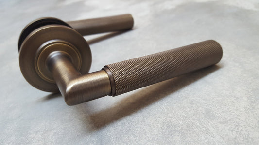 Piccadilly Knurled Antique Brass Door Handles - Frelan Hardware Burlington Range - Antique Brass/Bronze - BUR40/51AB CHAMFERED ROSE