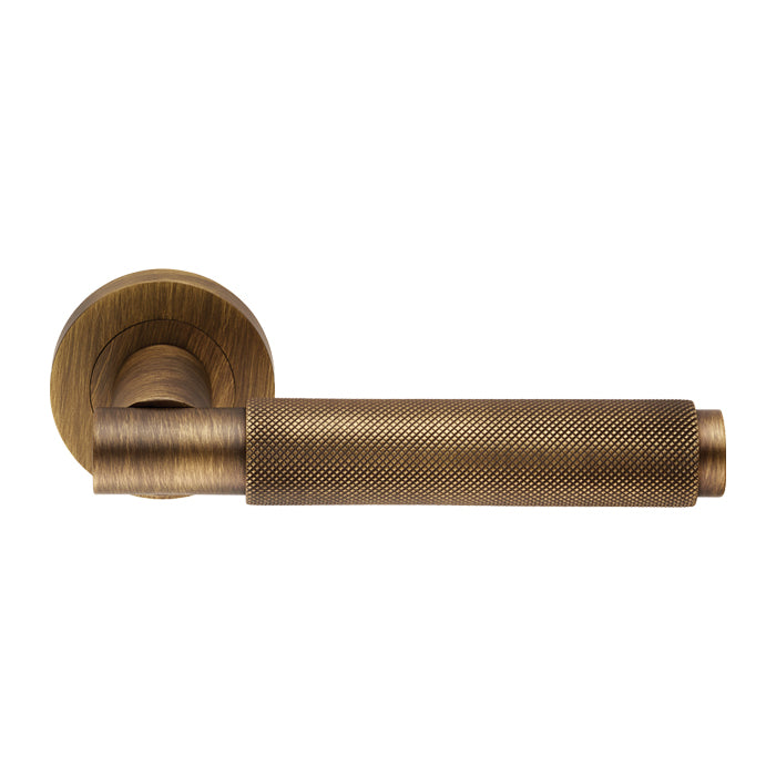Antique Brass Varese Knurled Lever Door Handles on Round Rose - EUL050AB