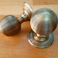 Lifestyle image of JR8MAB Frelan Hardware Reeded Antique Brass Door Knobs