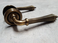 Thumbnail for Antique Brass Parisian Lever Door Handles on Round Rose - M4D652AB