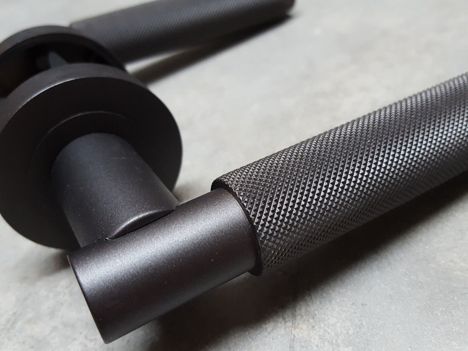 Knurling Detail on Carlisle Brass Varese Matt Bronze Lever Door Handle - EUL050MBRZ
