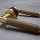 Satin Brass Varese Knurled Lever Door Handles on Round Rose - EUL050SB - Carlisle Brass
