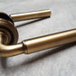Antique Brass Parisian Lever Door Handles on Round Rose