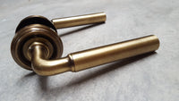 Thumbnail for Antique Brass Parisian Lever Door Handles on Round Rose - M4D650AB