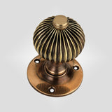 Dark Room Image - Aged Brass Regency Mortice Door Knobs (Solid Brass) - SB2111AGB