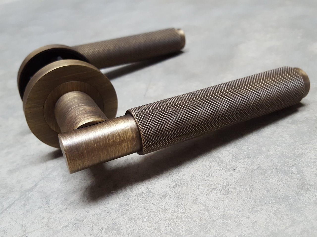 Antique Brass Varese Knurled Lever Door Handles on Round Rose - EUL050AB - Finishes Collection by Carlisle Brass